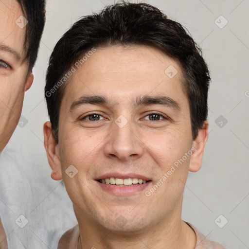 Joyful white young-adult male with short  brown hair and brown eyes