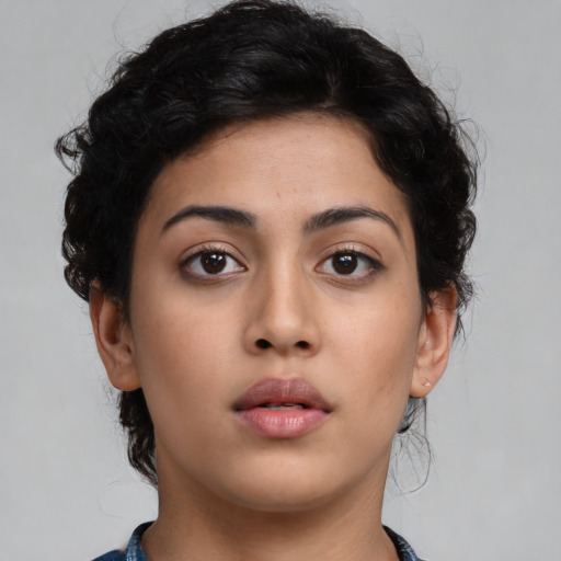 Neutral latino young-adult female with short  brown hair and brown eyes
