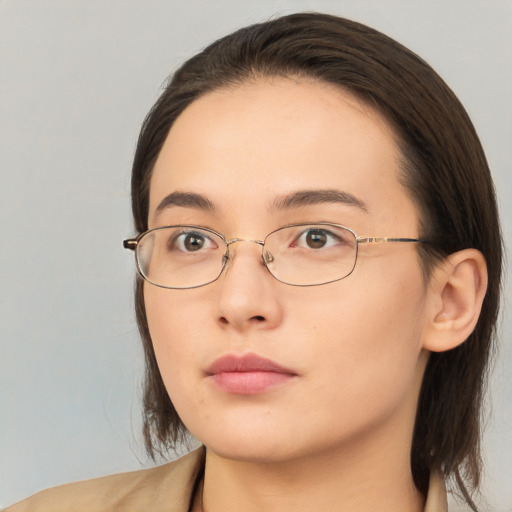 Neutral white young-adult female with medium  brown hair and brown eyes