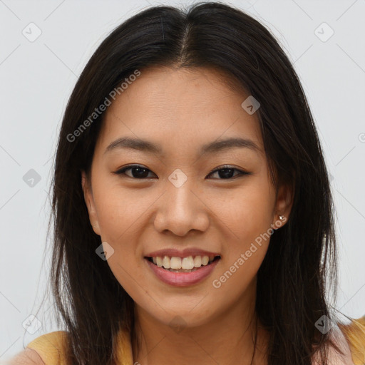 Joyful asian young-adult female with long  brown hair and brown eyes