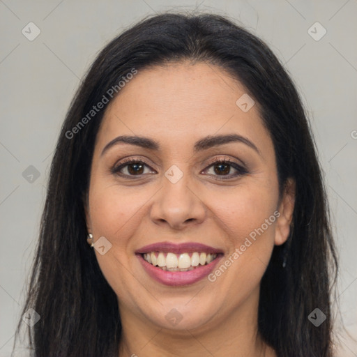 Joyful latino young-adult female with long  brown hair and brown eyes