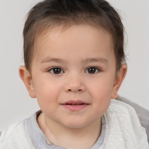 Joyful white child female with short  brown hair and brown eyes