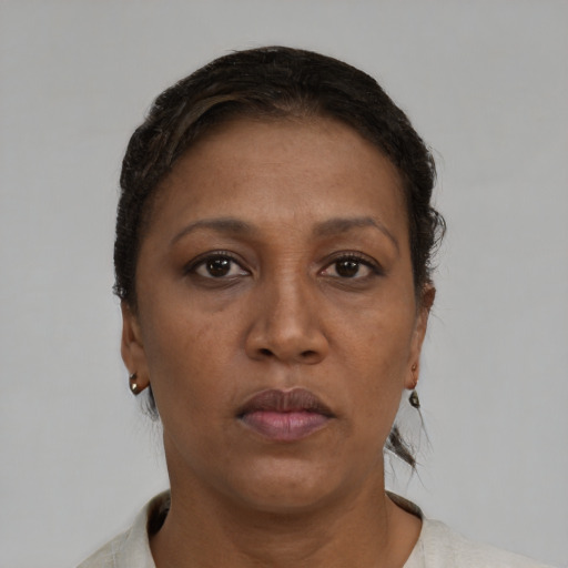 Neutral black adult female with short  brown hair and brown eyes