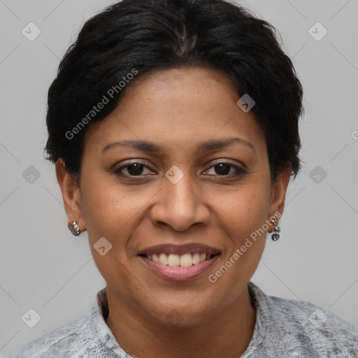 Joyful black adult female with short  brown hair and brown eyes
