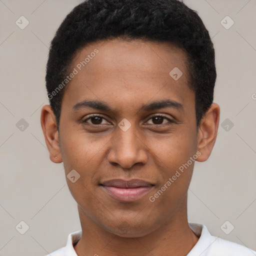 Joyful black young-adult male with short  black hair and brown eyes