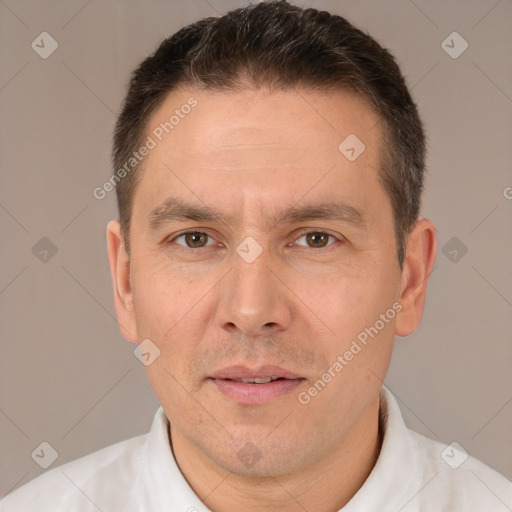 Joyful white adult male with short  brown hair and brown eyes