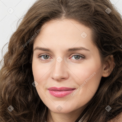 Joyful white young-adult female with long  brown hair and green eyes