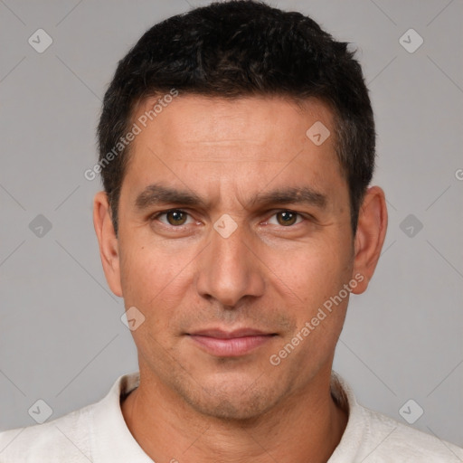 Joyful white adult male with short  brown hair and brown eyes