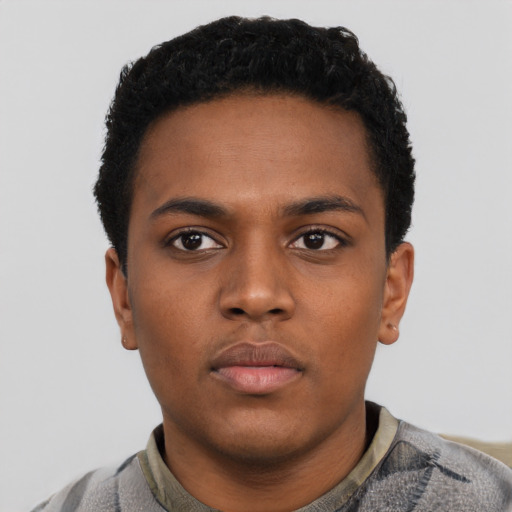 Neutral black young-adult male with short  black hair and brown eyes