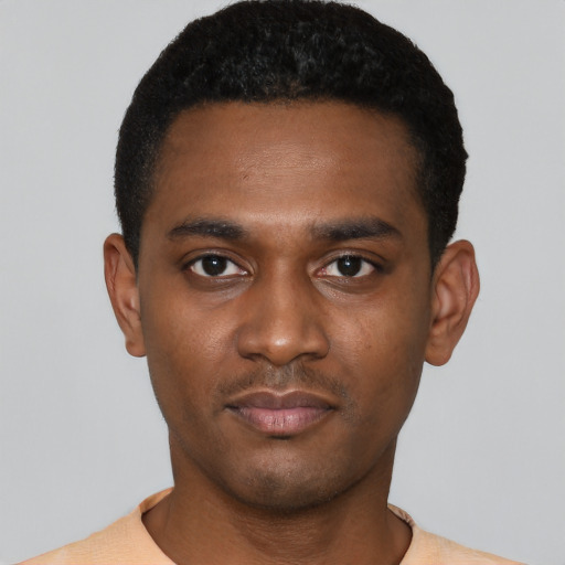 Neutral black young-adult male with short  black hair and brown eyes