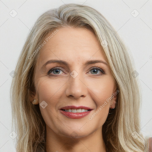 Joyful white adult female with long  brown hair and brown eyes