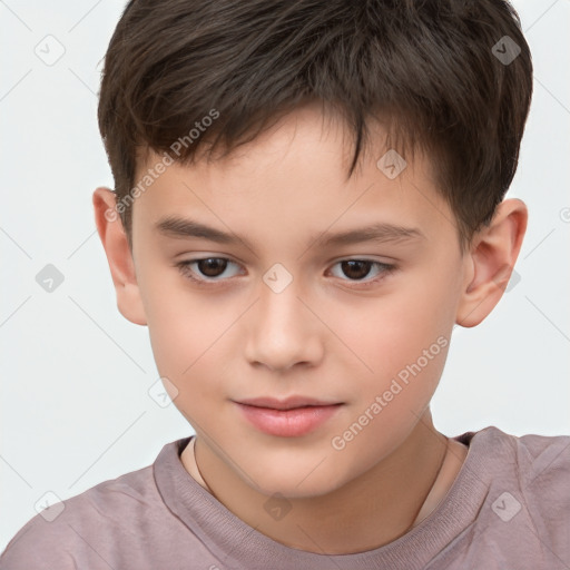 Joyful white child male with short  brown hair and brown eyes