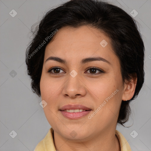 Joyful latino young-adult female with medium  brown hair and brown eyes