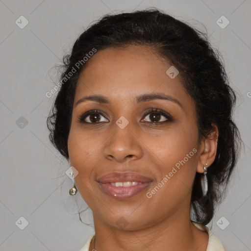 Joyful black young-adult female with medium  brown hair and brown eyes