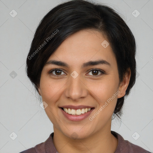 Joyful latino young-adult female with medium  brown hair and brown eyes