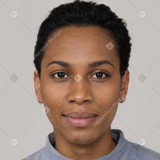 Joyful black young-adult female with short  black hair and brown eyes