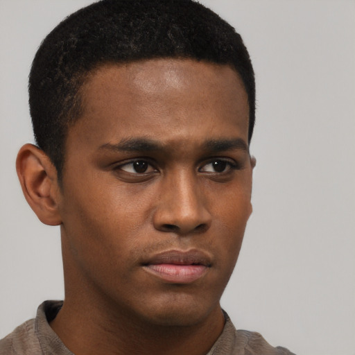 Neutral black young-adult male with short  brown hair and brown eyes