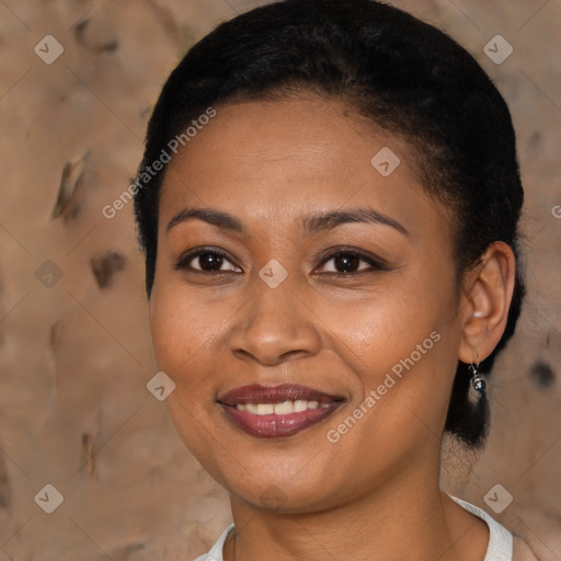 Joyful black young-adult female with medium  brown hair and brown eyes