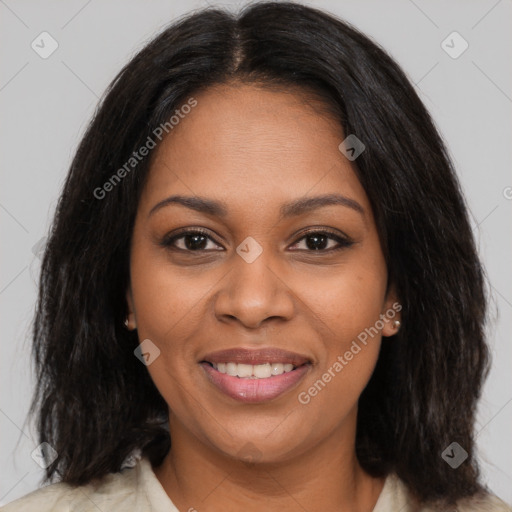 Joyful black young-adult female with medium  brown hair and brown eyes