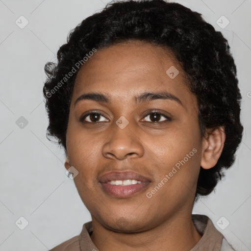 Joyful black young-adult female with short  black hair and brown eyes