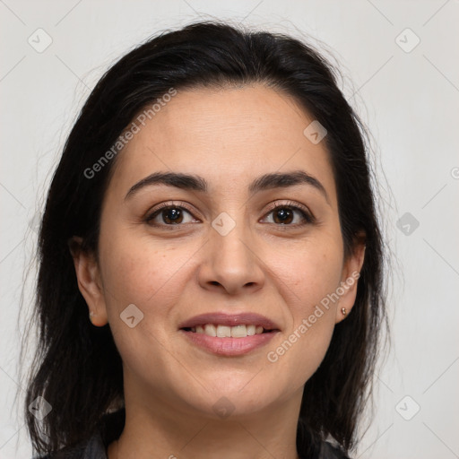 Joyful white young-adult female with long  brown hair and brown eyes