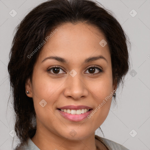 Joyful latino young-adult female with medium  brown hair and brown eyes