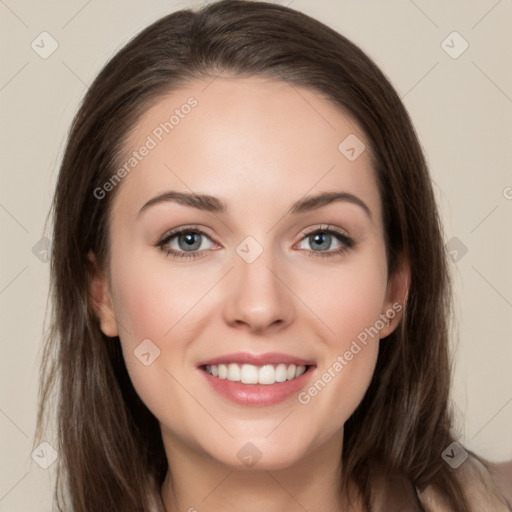 Joyful white young-adult female with long  brown hair and grey eyes