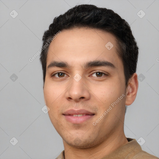 Joyful white young-adult male with short  black hair and brown eyes