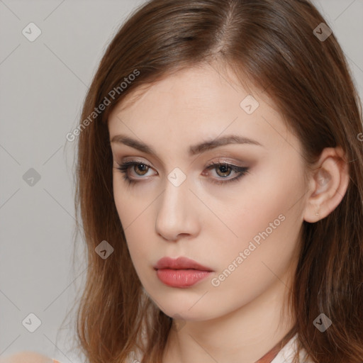 Neutral white young-adult female with long  brown hair and brown eyes