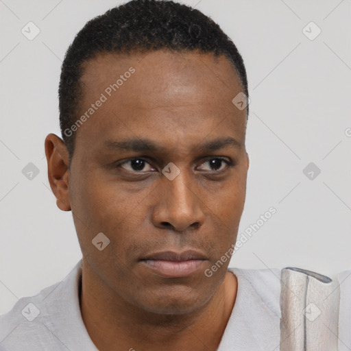 Neutral black young-adult male with short  black hair and brown eyes
