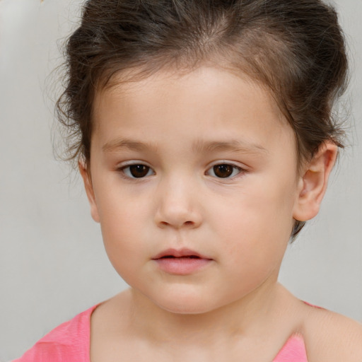 Neutral white child female with short  brown hair and brown eyes