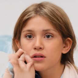 Neutral white child female with medium  brown hair and brown eyes