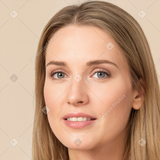 Joyful white young-adult female with long  brown hair and grey eyes