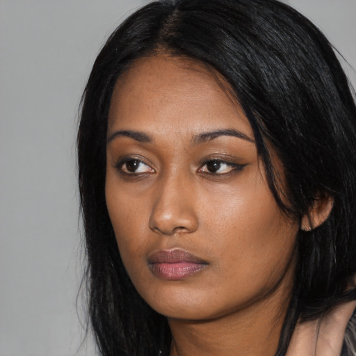 Neutral asian young-adult female with long  black hair and brown eyes