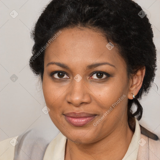 Joyful black young-adult female with medium  brown hair and brown eyes