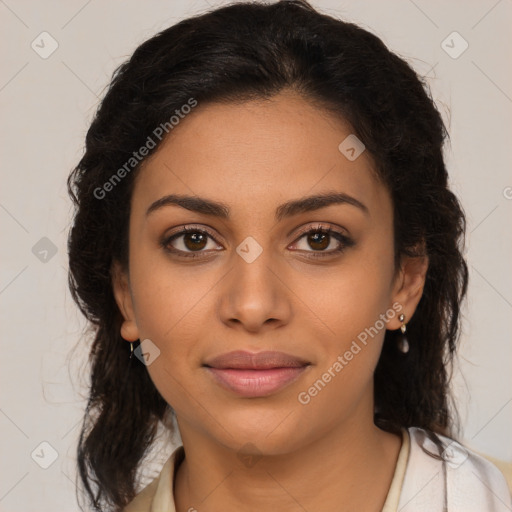 Joyful latino young-adult female with medium  brown hair and brown eyes