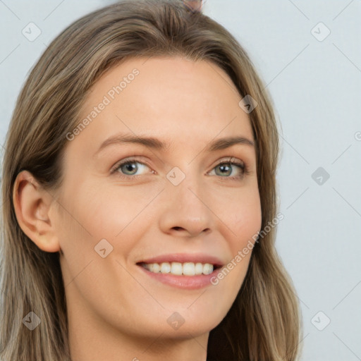 Joyful white young-adult female with long  brown hair and grey eyes