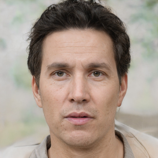 Neutral white adult male with short  brown hair and brown eyes