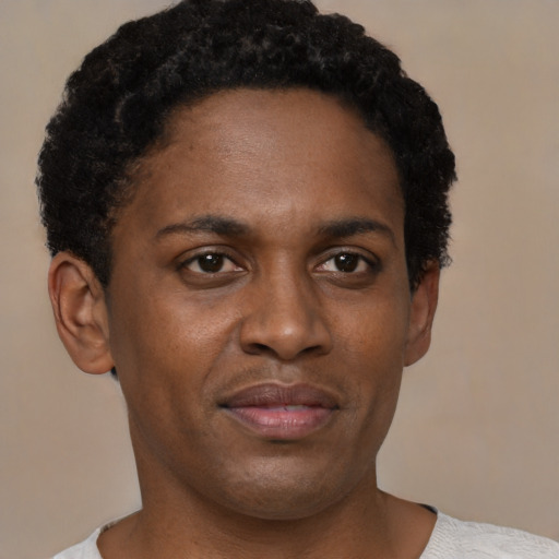 Neutral black young-adult male with short  brown hair and brown eyes