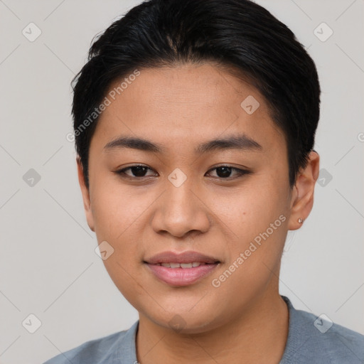 Joyful asian young-adult female with short  brown hair and brown eyes