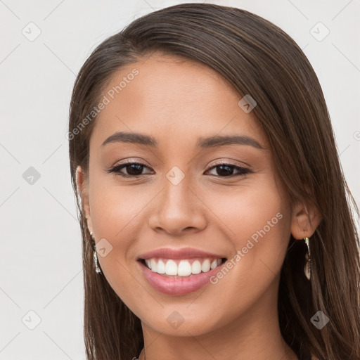 Joyful white young-adult female with long  brown hair and brown eyes