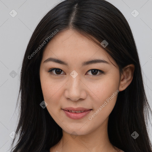 Joyful asian young-adult female with long  brown hair and brown eyes