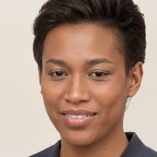 Joyful white young-adult female with short  brown hair and brown eyes