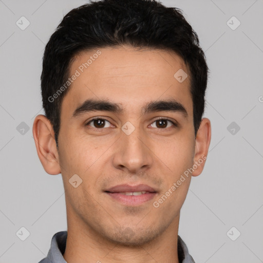 Joyful white young-adult male with short  black hair and brown eyes