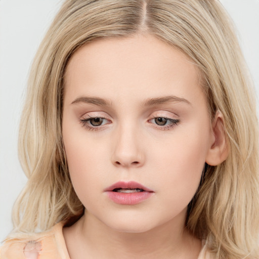 Neutral white young-adult female with long  brown hair and blue eyes