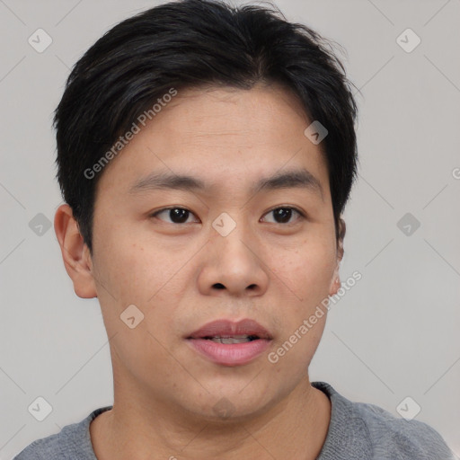 Neutral asian young-adult male with short  black hair and brown eyes