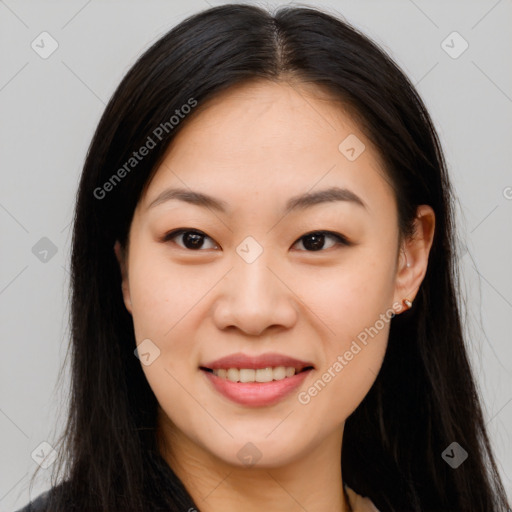 Joyful asian young-adult female with long  brown hair and brown eyes