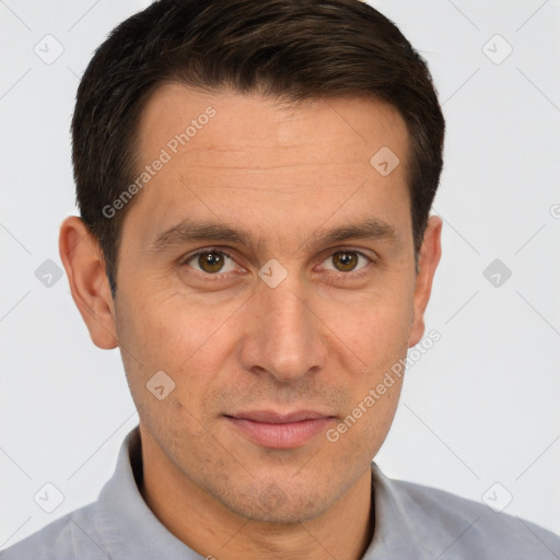 Joyful white adult male with short  brown hair and brown eyes