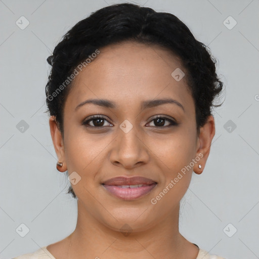 Joyful latino young-adult female with short  brown hair and brown eyes