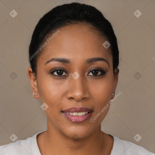 Joyful black young-adult female with short  black hair and brown eyes